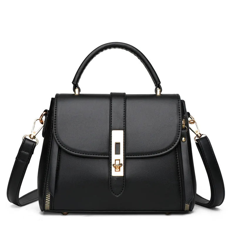 Women's soft black PU leather vertical messenger bag with adjustable strap, showing interior polyester lining.