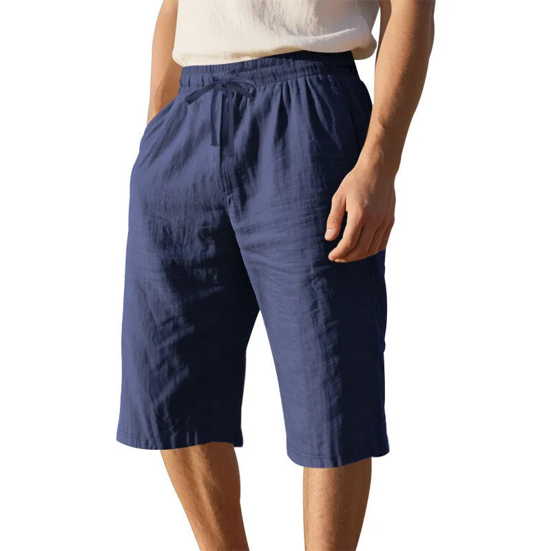 Men's linen shorts in light blue with drawstring waist and cropped straight-leg design