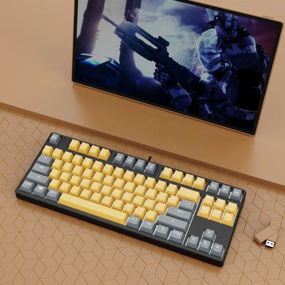87-key mechanical keyboard with two-tone coloured keycaps on metal case