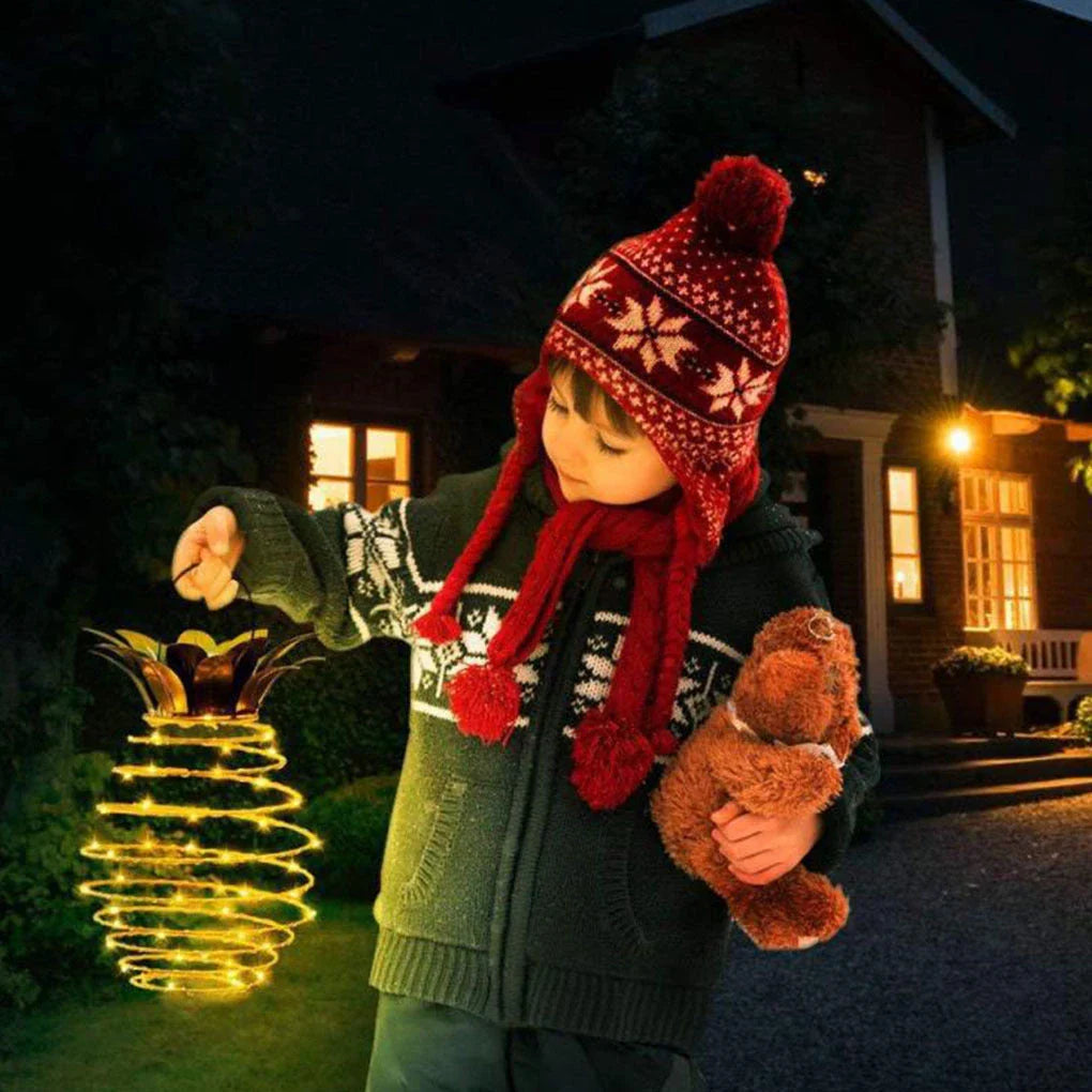 Elegant solar-powered pineapple-shaped garden lights with warm white LED illumination