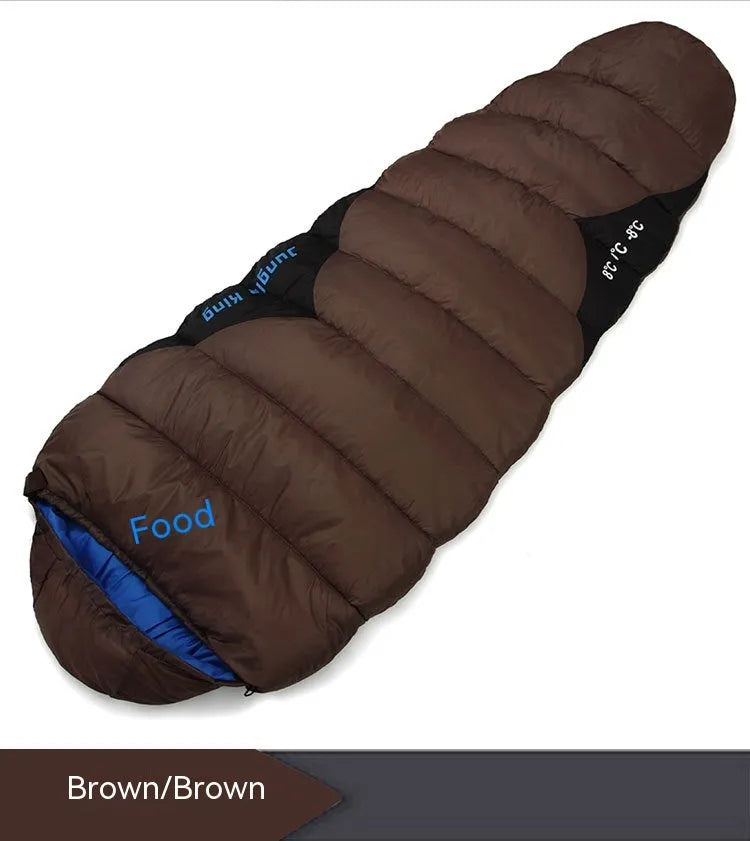 Outdoor mummy sleeping bag in army green with a compression sack, shown unrolled.