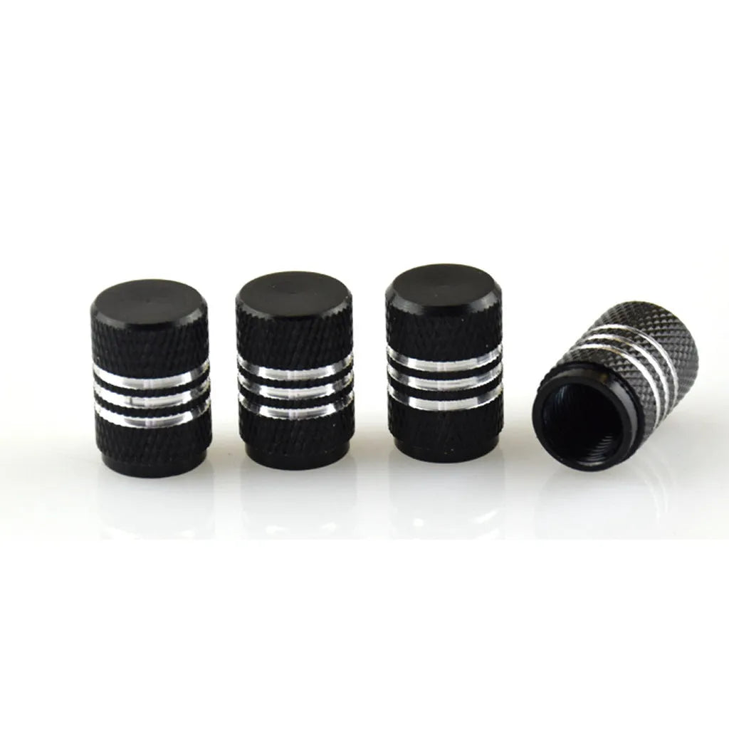 Set of stainless steel car tyre valve caps in multiple colours: black, red, blue, gold, silver, green, purple, sky blue, grey, orange.