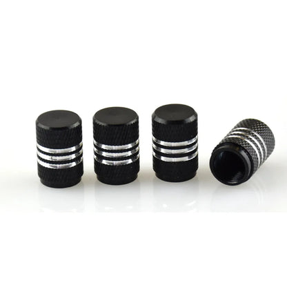 Set of stainless steel car tyre valve caps in multiple colours including black, red, blue, and gold.