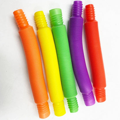 Colorful, flexible sensory fidget tube toy for kids, featuring vibrant colors and customizable shapes to promote creativity and sensory development