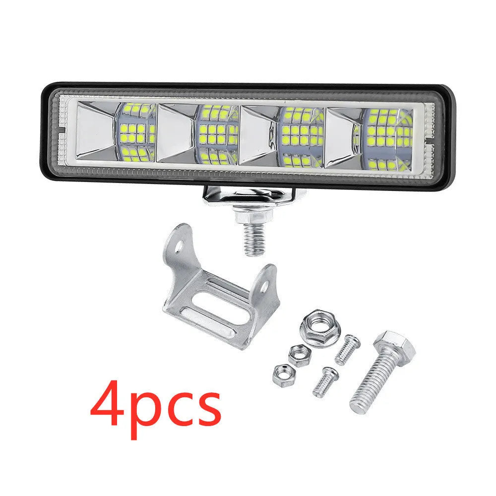 Pack of four rectangular aluminium LED work lights for car and truck modification.