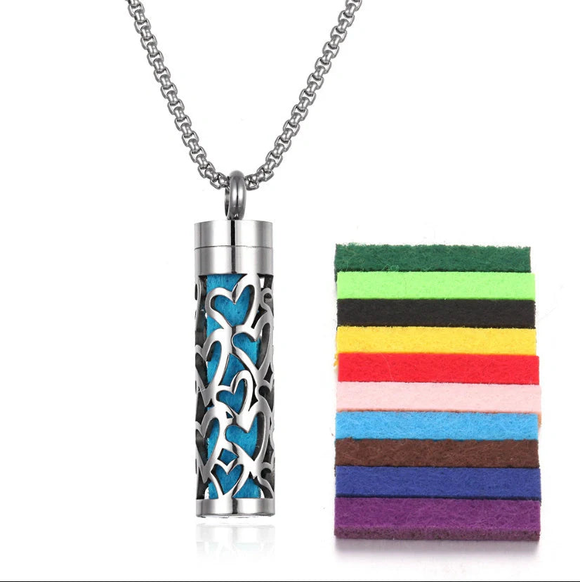 Titanium steel aromatherapy pendant with essential oil diffuser in various color options