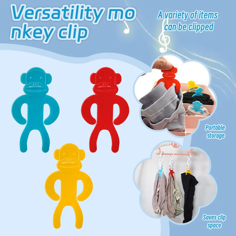 Set of blue, red, and yellow plastic socks clips holding pairs of socks together for laundry organisation