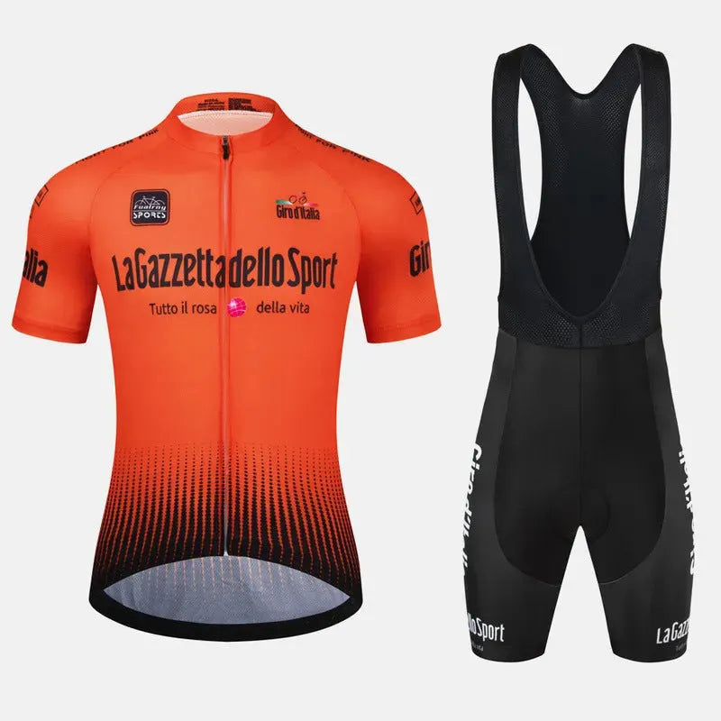 Loop short sleeve cycling suit in a patterned colour on a road bike, showing moisture-wicking fabric.