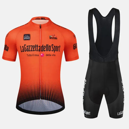 Loop short sleeve cycling suit in a patterned colour on a road bike, showing moisture-wicking fabric.