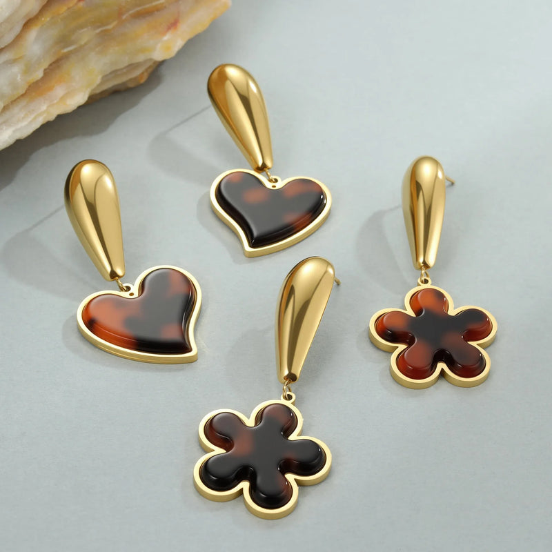 Women's stainless steel earrings in tortoiseshell resin hawksbill colour with 18K gold electroplating, available as fashionable geometric heart-shaped or floral design fashion OL style studs for everyday wear