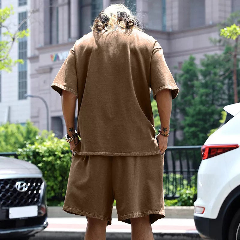 Men's loose sports set with round neck T-shirt and drawstring shorts in various colors