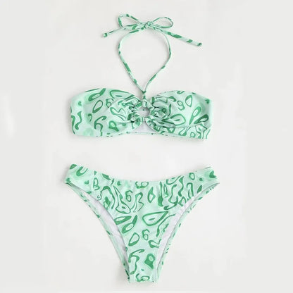 Blue floral pattern bandeau bikini swimsuit with backless design on mannequin