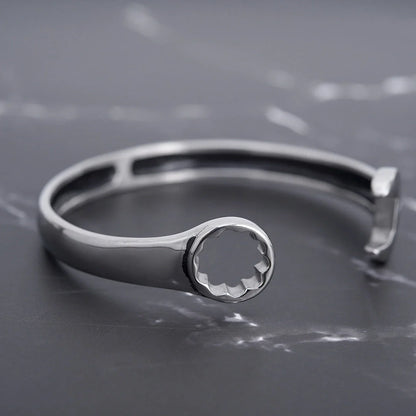 Sleek stainless steel personalized wrench bracelet with adjustable clasp, showcasing industrial-chic style