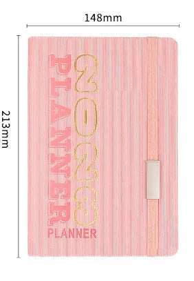Creative student almanac diary with imitation leather cover open on a calendar page.