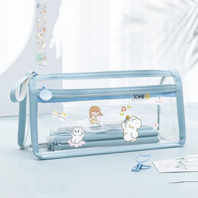 Transparent double-layer pencil case in blue showing organised stationery inside compartments