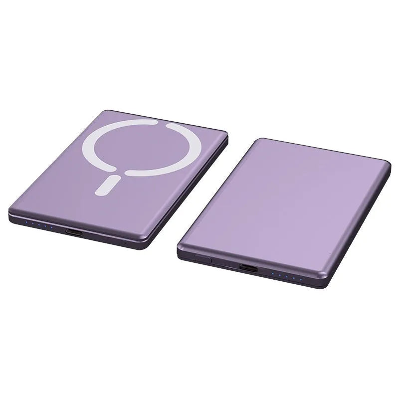 Slim dark grey magnetic power bank attached to the back of an iPhone, showing its thin 9mm profile.