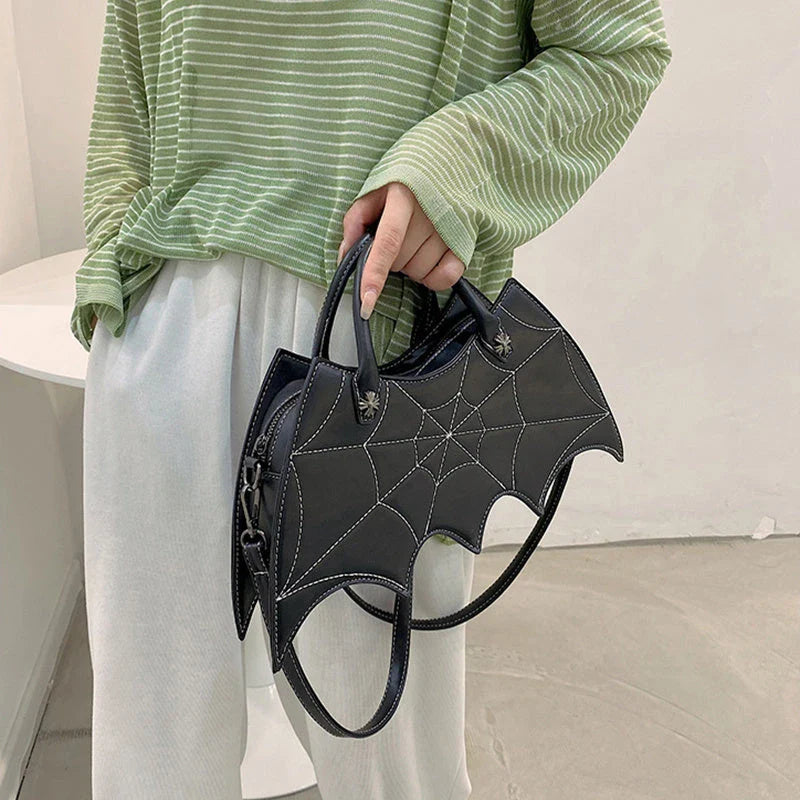 Stylish Halloween spider web crossbody bag in various colors, including black, white, brown, pink, and purple