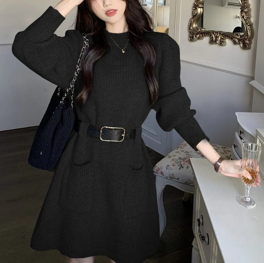 Women's long sleeve loose knitted dress in beige with black belt, showing high waist design and free size fit