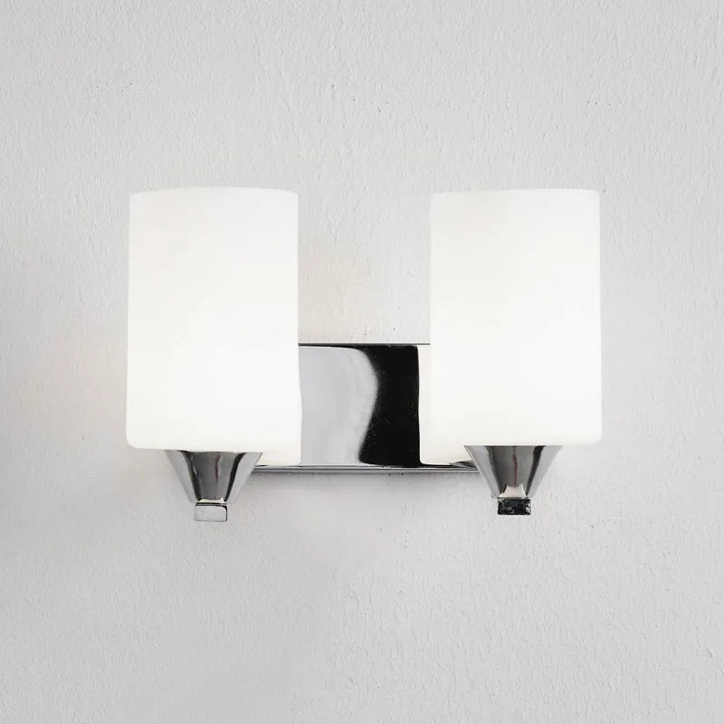 Minimalist chrome glass wall lamp with adjustable light colours for bedside illumination