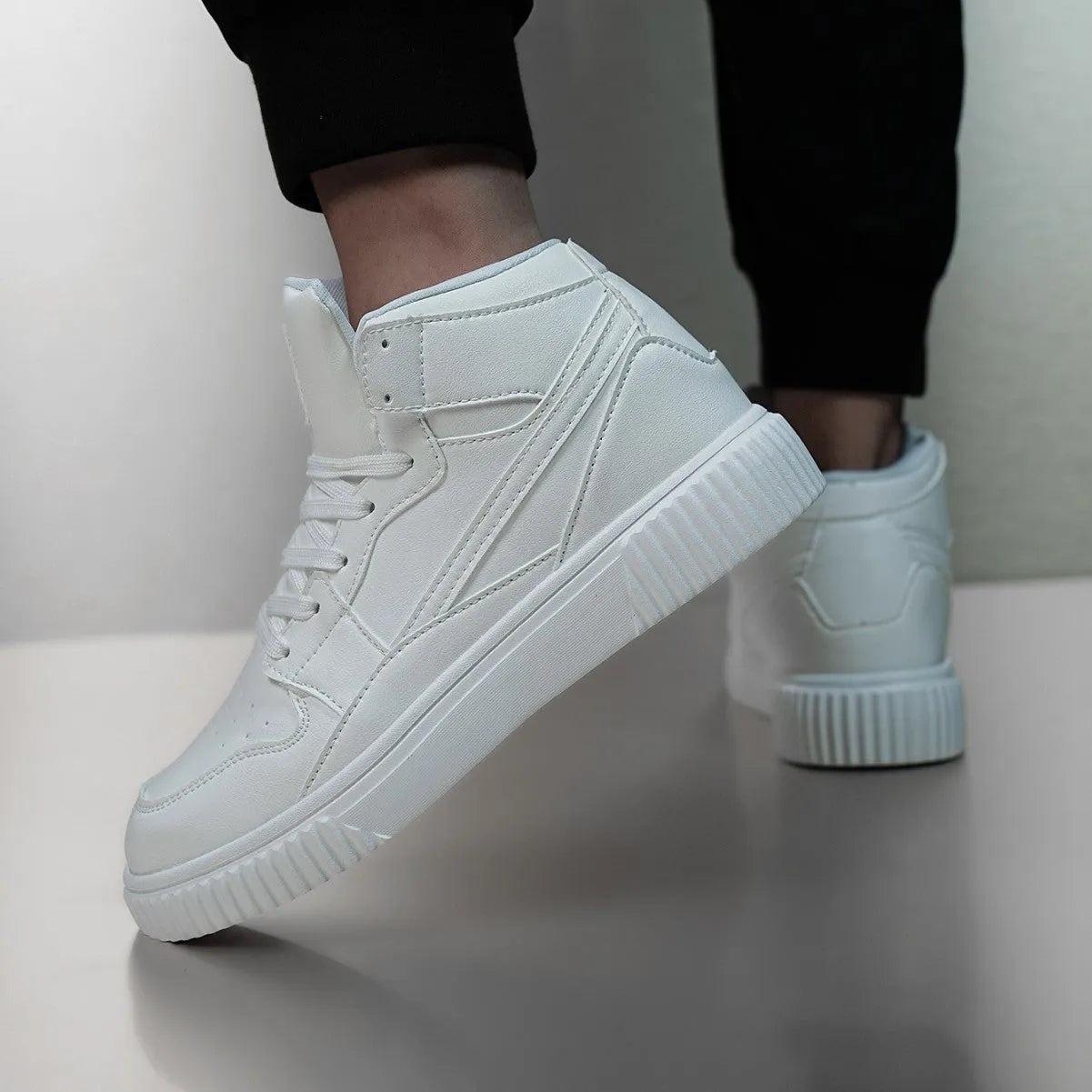 Men's white casual shoes with round toe design and microfiber upper, shown in size 42 on neutral background