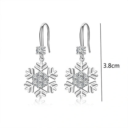 Elegant snowflake earrings with rhinestones, a personalized Christmas jewelry accessory for fashionable women