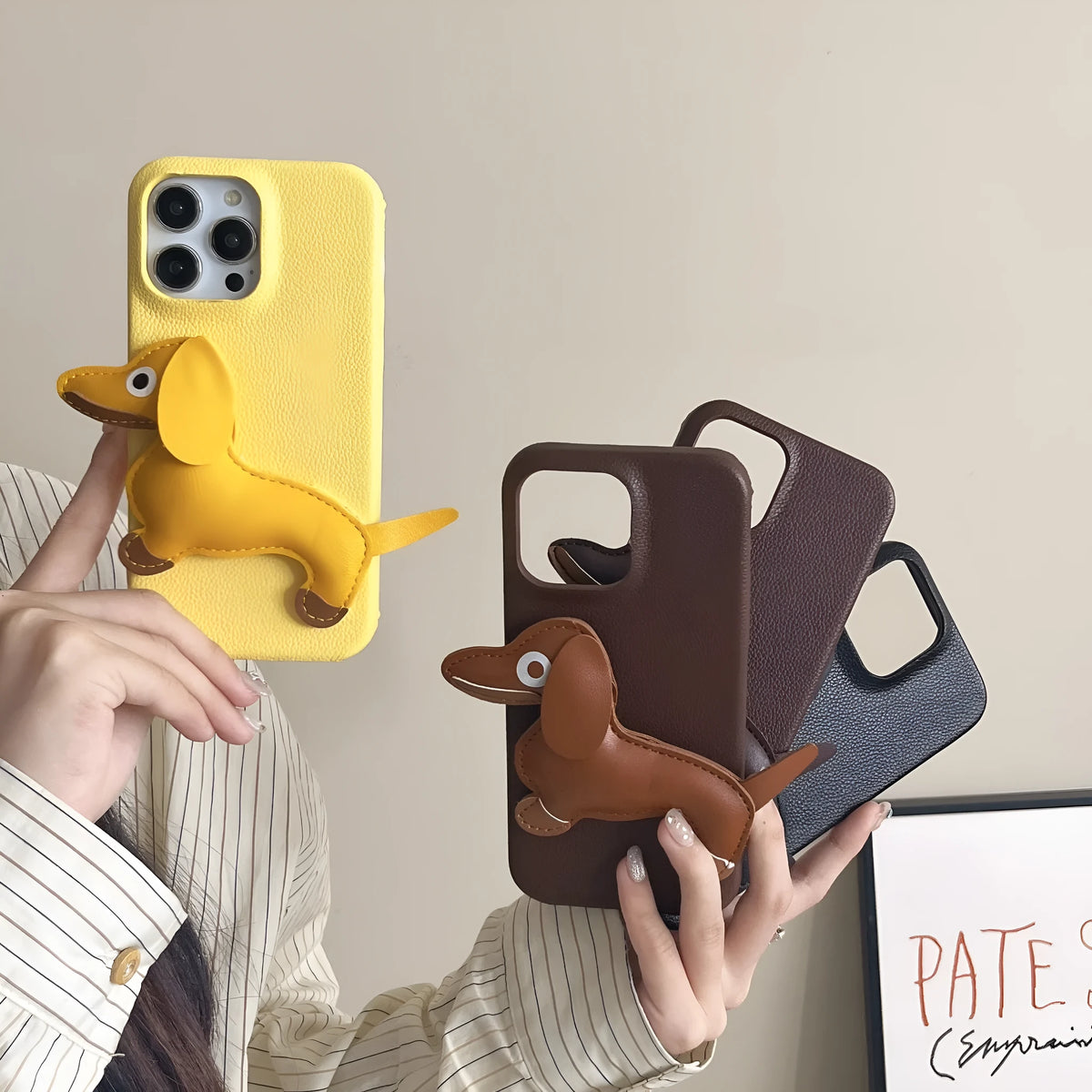 Leather sausage dog iPhone case with embossed 3D dachshund design in brown, all-inclusive anti-fall cover