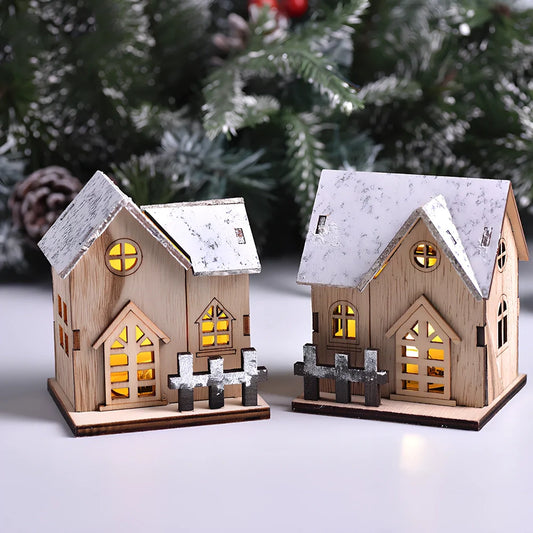 LED illuminated wooden Christmas cabin measuring 8cm by 7cm by 9.5cm with festive lighting
