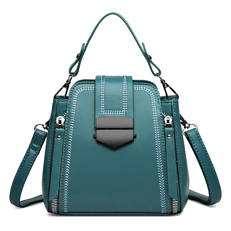 Soft PU leather ladies handbag with textured surface and sewing thread detailing in square vertical shape