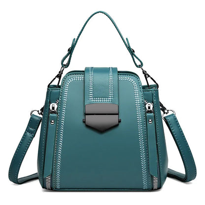 Soft PU leather ladies handbag with textured surface and sewing thread detailing in square vertical shape