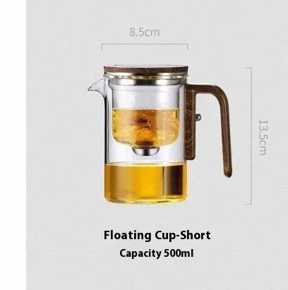 Elegant glass tea infuser pot with magnetic separation technology, wooden handle, and precise pouring spout