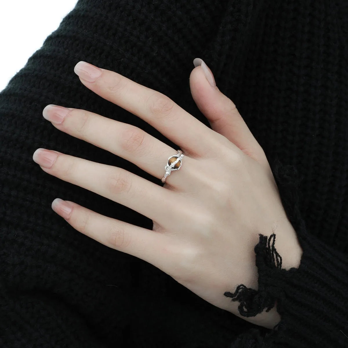 Silver saturn open ring with adjustable opening in white gold colour finish featuring tigereye design elements