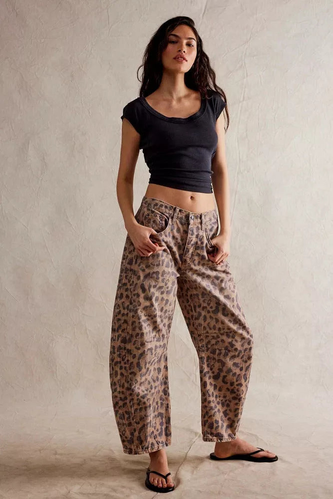 Women's mid-rise barrel jeans with wide leg design in various colors