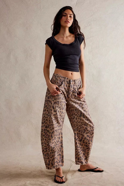 Women's mid-rise barrel jeans with wide leg design in various colors