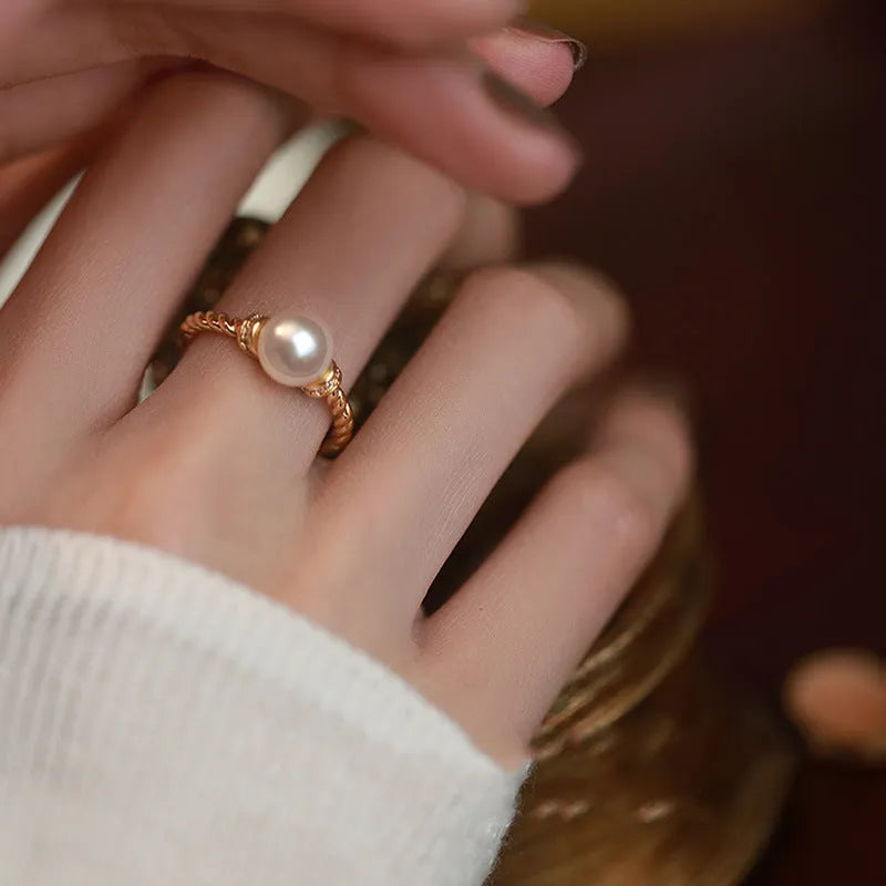 Adjustable copper ring with pearl inlay in geometric twist design, gold or silver finish