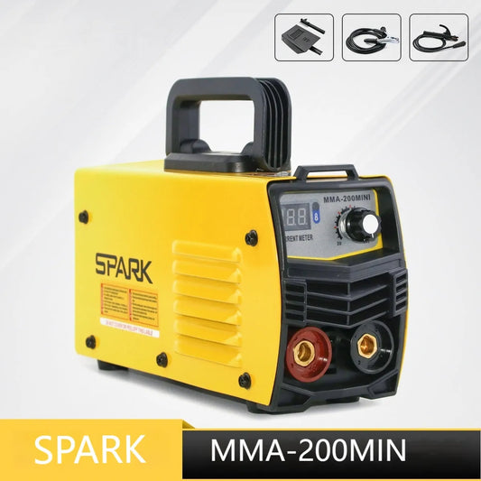 Small portable DC welding machine with red housing, welding tongs, and face shield on a workshop bench