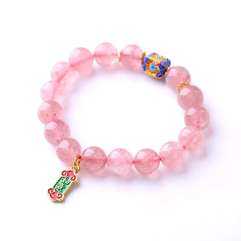 Pink strawberry quartz crystal bracelet with Ruyi charm, hand-woven in a national style.