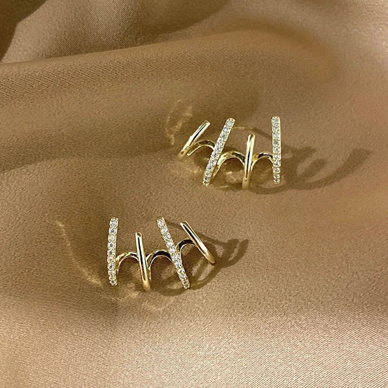 Elegant silver-tone zircon stud earrings with a sleek and sophisticated design