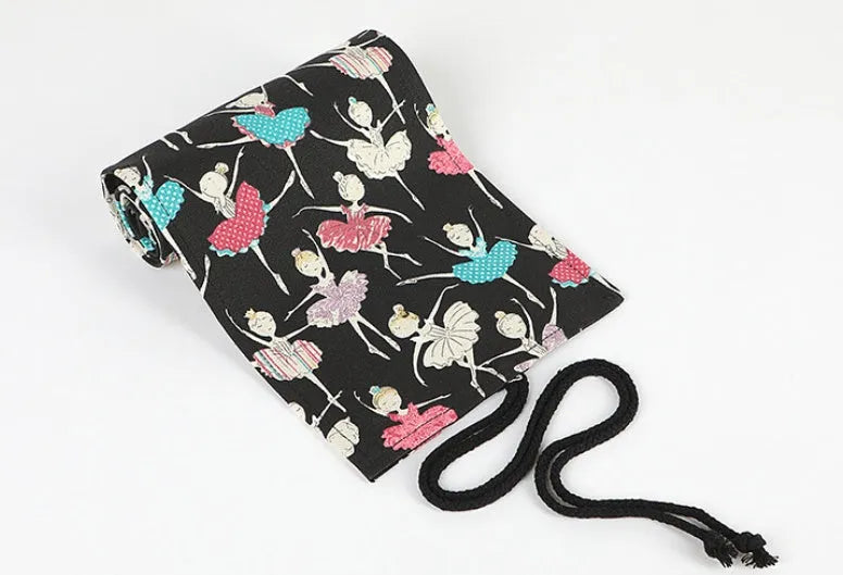 Canvas rolling pencil case with ballet girl print showing elastic loops for pencil storage