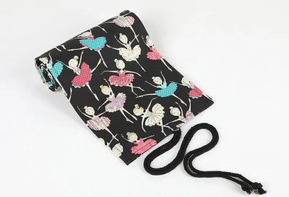 Canvas rolling pencil case with ballet girl print showing elastic loops for pencil storage