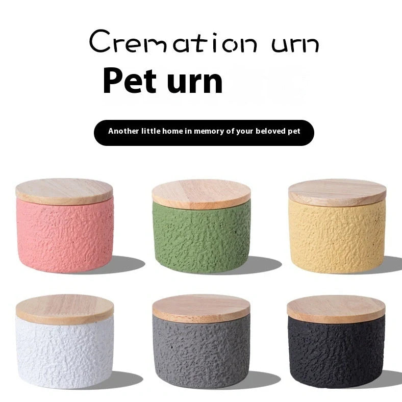 Handmade cement cinerary casket for pet ashes in six colours: black, grey, green, pink, white, yellow