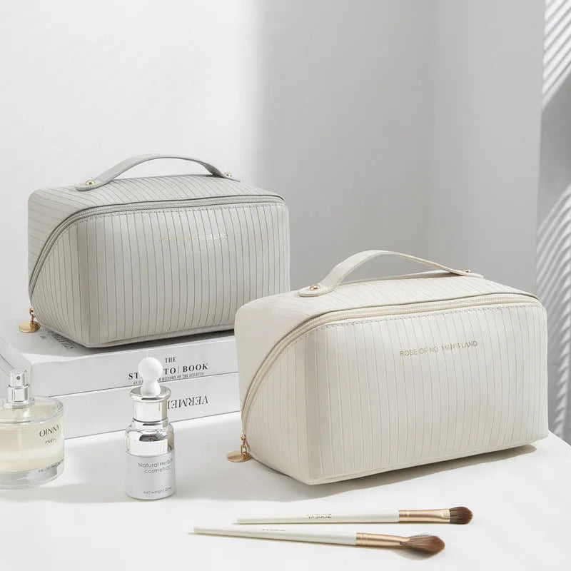 Vertical pattern pillow makeup bag with cubic 22.5x12.5x12.5cm dimensions in beige, black, brown, grey or pink