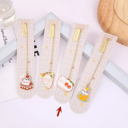 Jane Lime Foodie cat creative metal bookmark with cartoon pendant on a book page.