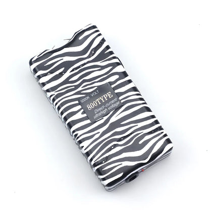 Purple self-defence torch with 100-lumen LED and emergency alarm function measuring 15cm