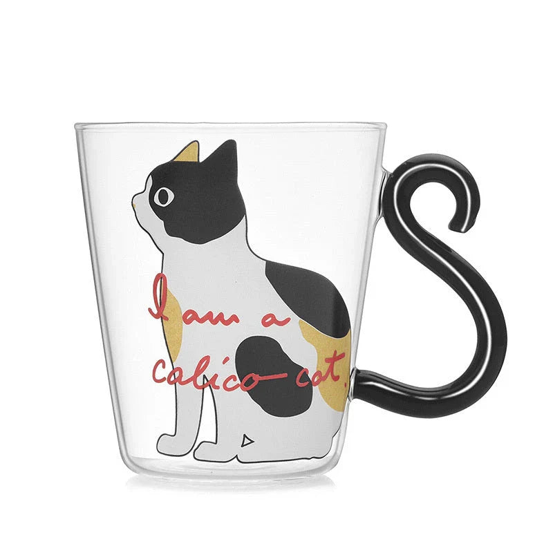Adorable cat-shaped glass mug in black and white colors, perfect for coffee, tea, or juice