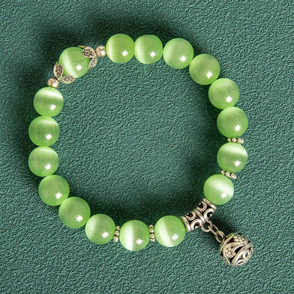 10MM Hollow Ball Korean Style Crystal Opal Beaded Bracelet in black, purple, white, pink, and green