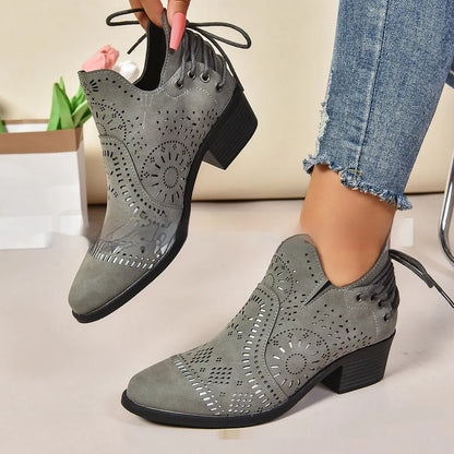 Women's plus size mid-calf fashion boot in artificial PU leather, shown in black.