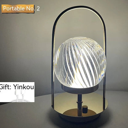 Metal portable ambience light with lantern shape measuring 11×23cm, showing touch controls and 27 colour options