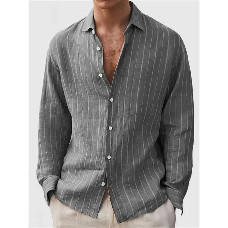 Man wearing a loose striped cardigan-style shirt with short sleeves.
