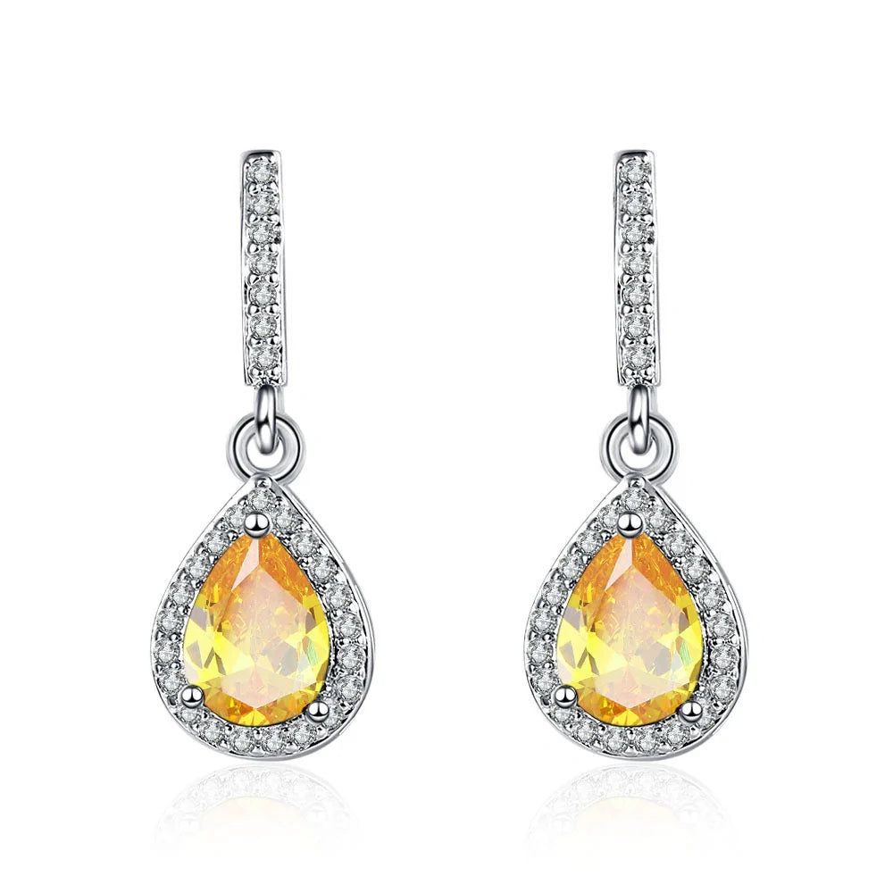 Elegant drop-shaped earrings featuring shimmering zircon stones in a variety of colors, including white, yellow, blue, and red diamond.