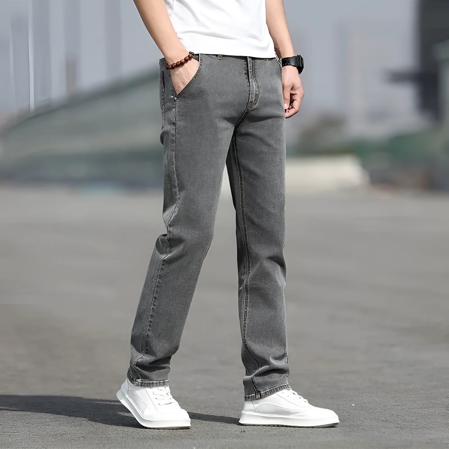 Smoky gray men's straight leg jeans with rabbit fur fabric on a hanger.